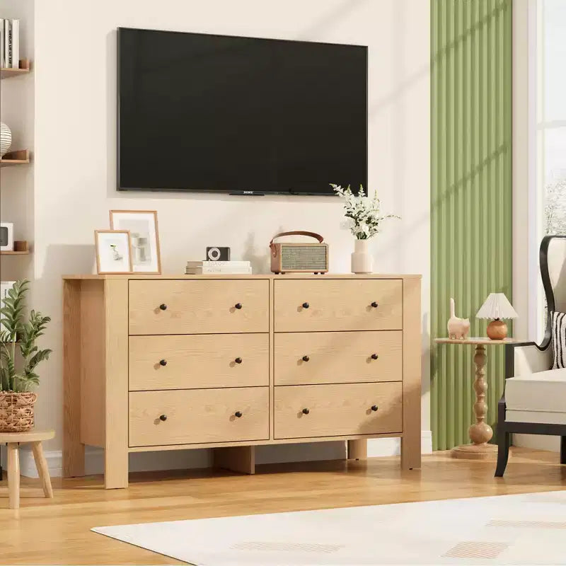 Une commode à six tiroirs convient aux chambres à coucher, aux entrées, aux couloirs,