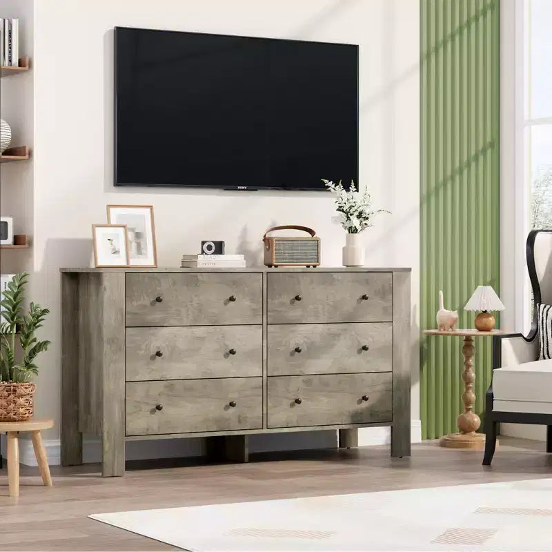 Une commode à six tiroirs convient aux chambres à coucher, aux entrées, aux couloirs,
